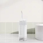 Vodotěsný mini IPX7 ústní irigátor Home Travel Water Flosser
